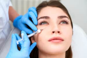 A close-up shot of a woman getting undereye filler in Boise, ID